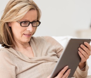 other types of paid market research lady using tablet